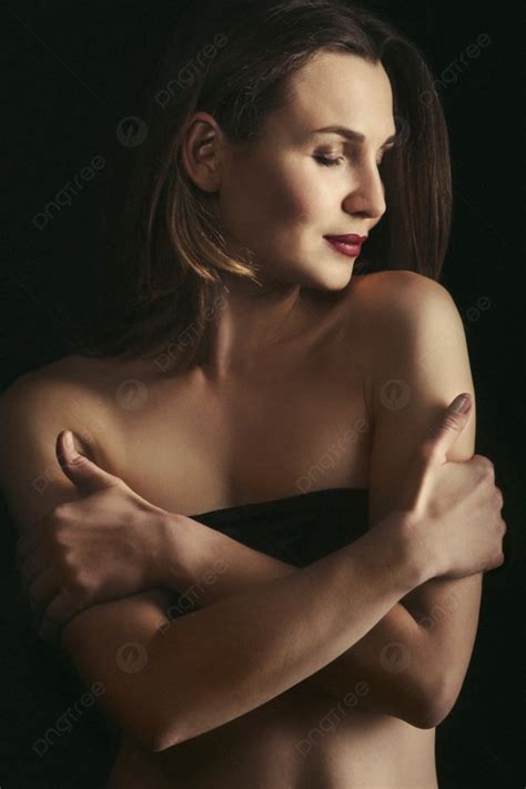 Girl Brunette Beauty Model In A Black Jacket On A Dark Blue Background Photo And Picture For