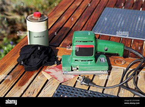 Sanding And Oiling Teak Wood Stock Photo Alamy