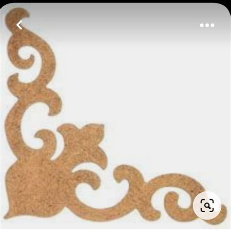 A Wooden Cutout Of A Cat With Swirls On It S Back And Tail