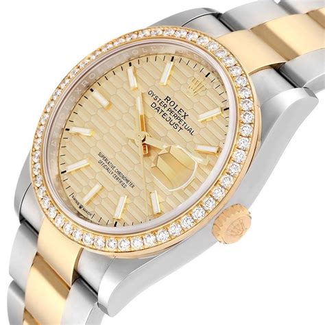 Rolex Montre Datejust en acier avec cadran cannelé en or jaune et