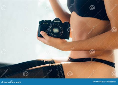 Woman On Black Lingerie Holding A Camera Editorial Image Image Of Film Camera 150605215