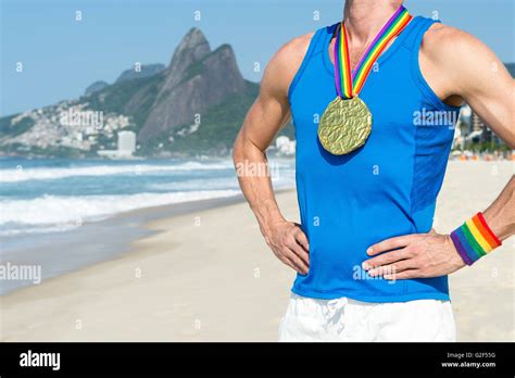 Gold Medal Gay Athlete Standing On Ipanema Beach In Rio De Janeiro Brazil Stock Photo Alamy