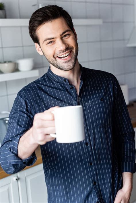 Handsome Man Holding Cup Of Coffee Stock Image Image Of Smiling