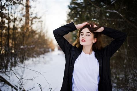 Free Photo Fashionable Long Legs Brunette Model In Long Black Cloak Posed Outdoor At Winter Day