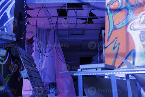 Demolished structure with neon lights turned into chaos, abandoned