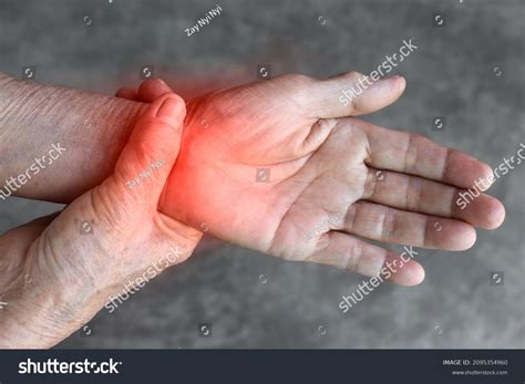 Pain Wrist Joint Southeast Asian Elder Stock Photo 2095354960