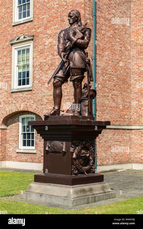 A Grade Ii Listed Statue Of Oliver Cromwell On A Plinth In The Grounds