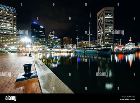 Waterfront Promenade And Modern Buildings At Night At The Inner Harbor