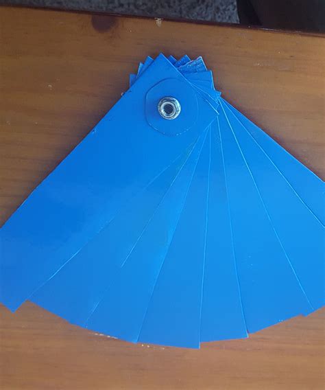 From Orange Juice Carton To Folding Hand Fan 5 Steps Instructables