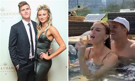Glamorous High Jump Star Amy Pejkovic Gets Cosy In The Hot Tub With Footy Star Reuben Garrick