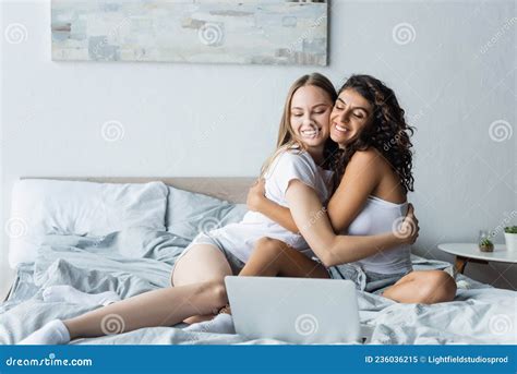 Positive Lesbian Couple Hugging Each Other Stock Image Image Of Gadget Lgbt