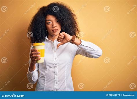 Young African American Business Woman With Afro Hair Drinking Coffee