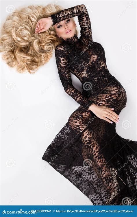 Beautiful Tall Slim Blonde With Amazing Body Dressed In An Elegant Dress Lace Dress Stock Image