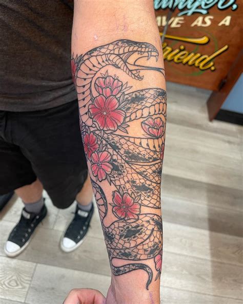 Half Sleeve Snake And Cherry Blossoms By Andrea Revenant At Deep Seas