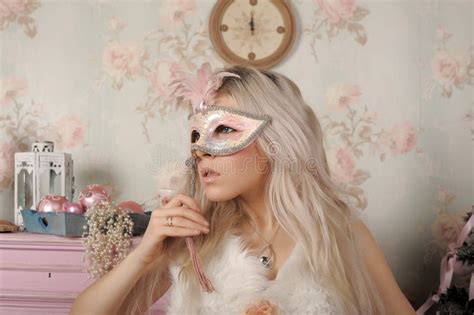 Beautiful Blonde Holds Carnival Mask In Her Face Stock Photo Image Of