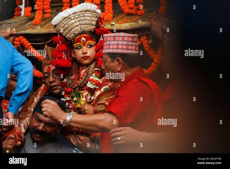 Caretakers Carry Nepals Living Goddess Kumari On Her Chariot During