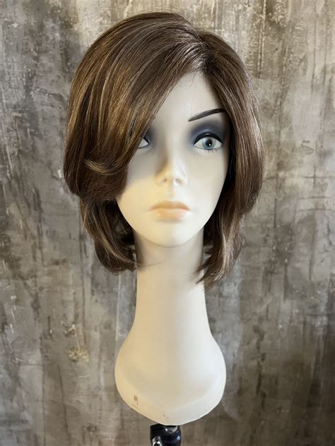 Stylists are debating sew in hairstyles versus high quality wigs 6