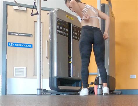 Gym Brunette In Tight Black Camo Leggings Bending Over Part Spandex Leggings Yoga Pants