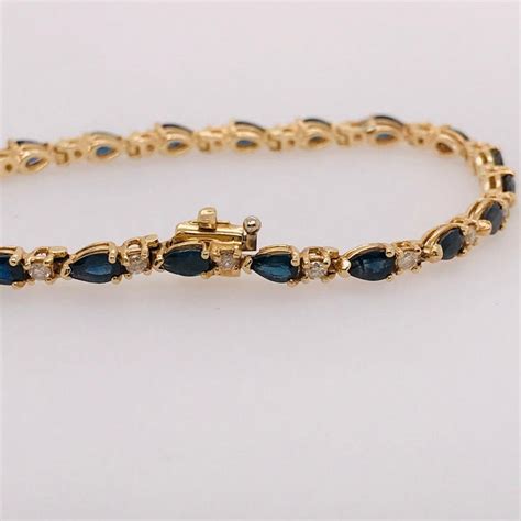 Blue Sapphire And Diamond Tennis Bracelet In 14k Yellow Gold Five Star