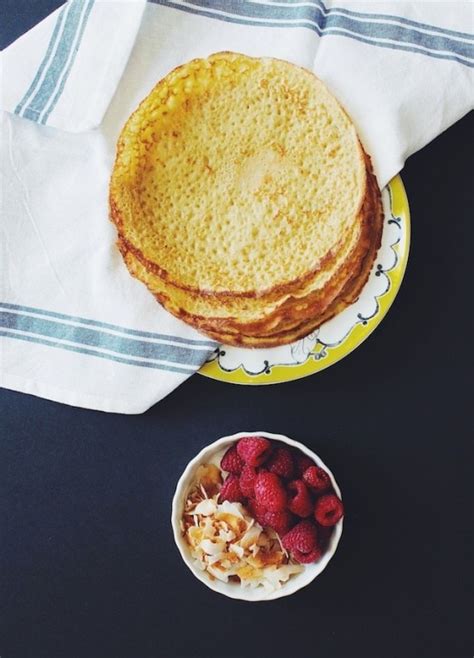 Gluten Free Oat Crepes With Raspberries Toasted Coconut