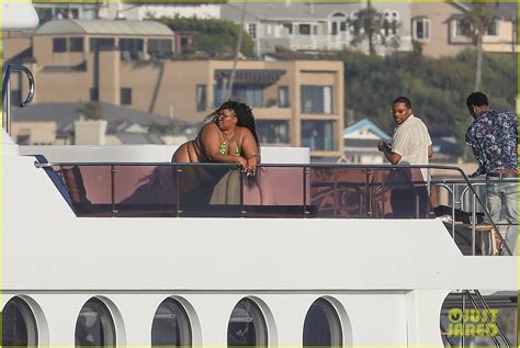 Photo Lizzo Boat Day In Green Bikini Photo Just Jared