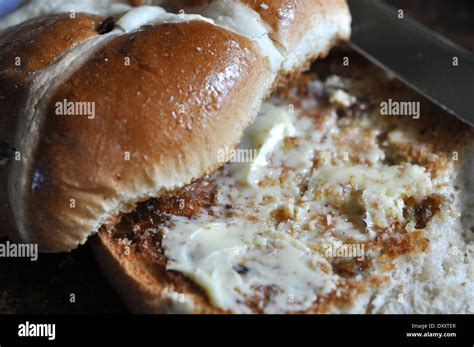 Toasted Hot Cross Bun With Butter Stock Photo Alamy