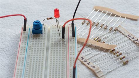 Potentiometer Resistors And Red Led Set Up On A Breadboard Stock Photo