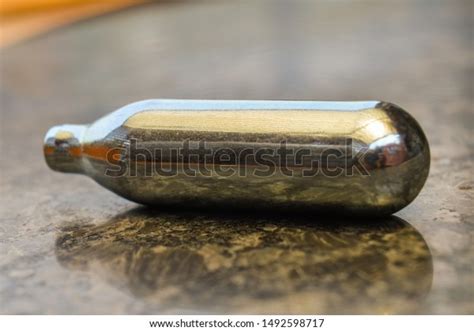 Small Gas Cylinder Isolated On Table Stock Photo 1492598717 Shutterstock