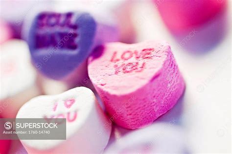 Candy hearts display messages for Valentines Day. - SuperStock