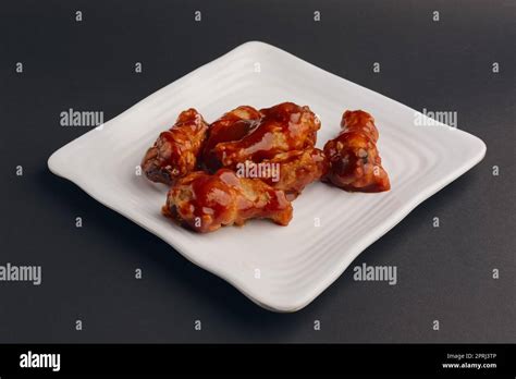 Hot spicy fried chicken wings Stock Photo - Alamy