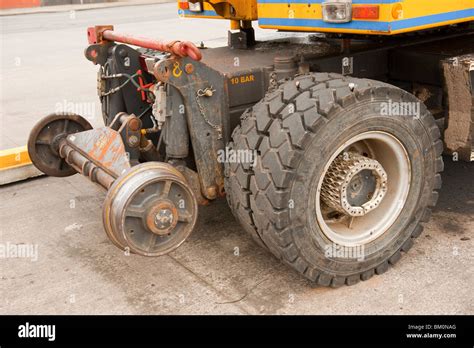 Road And Rail Track Wheels On Track Laying Digger Stock Photo Alamy