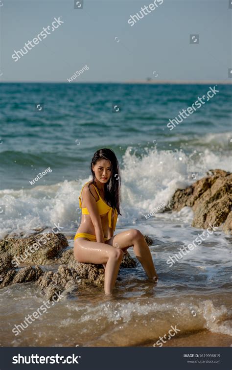 Sexy Asian Woman Wearing Yellow Bikini Stock Photo Shutterstock