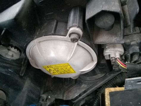 Замена лампочки ближнего света мицубиси л200