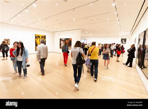 Art Gallery Visitors Visitors Looking At Modern Art Paintings Moma