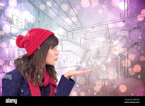 Festive Brunette Blowing A Kiss Against Light Glowing Dots On Purple Stock Photo Alamy