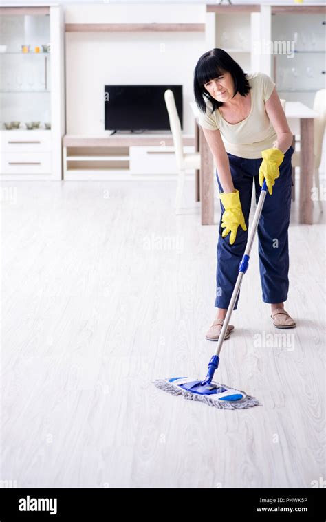 Old Mature Woman Tired After House Chores Stock Photo Alamy
