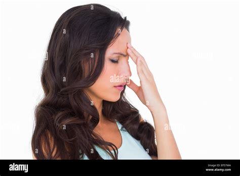 Pretty Brunette Getting A Headache Stock Photo Alamy