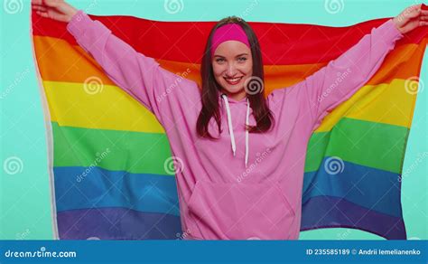 Cheerful Cute Girl Smiling With Rainbow LGBT Flag Celebrate Parade Show Tolerance Same Sex