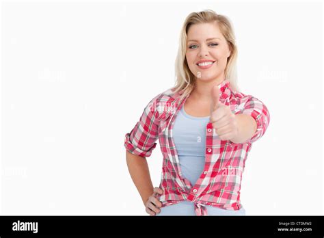 Happy Blonde Woman Placing Her Thumbs Up Stock Photo Alamy