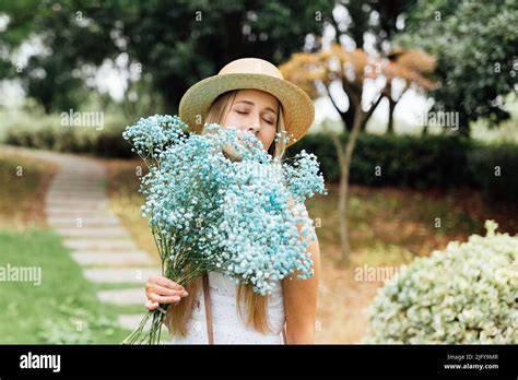 Portrait Of Beautiful Stylish Blonde Millennial Woman Posing Outdoor