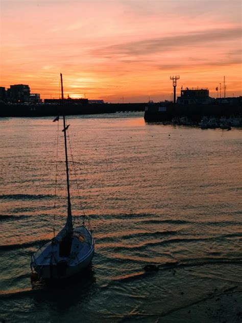 Boat On Sea During Sunset · Free Stock Photo