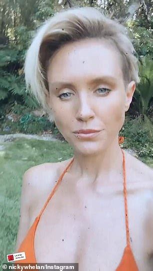 Nicky Whelan Shows Off Her Incredible Figure In A Skimpy Orange Bikini