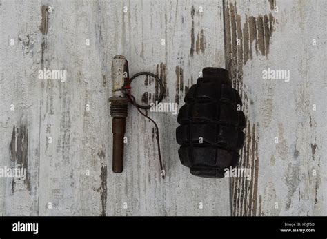 Old Hand Grenade On Wood Background Disguise Alarm Stock Photo Alamy