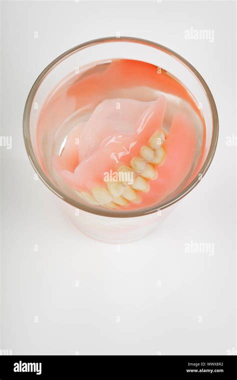 Dentures in glass water hi-res stock photography and images - Alamy