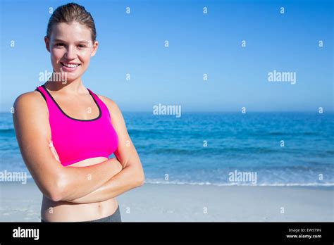 Fit Blonde Woman Standing Arms Crossed Stock Photo Alamy