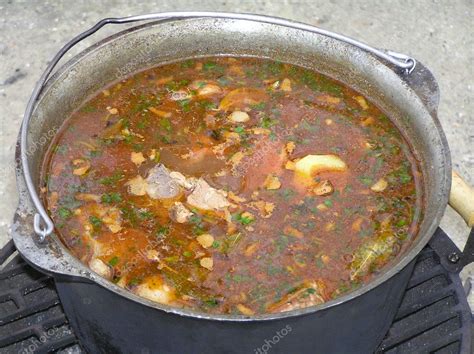 Boiling soup in the cauldron — Stock Photo © IvettaDolya #2821555