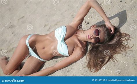 Woman In White Bikini Sunbathing On The Beach Stock Footage Video Of Photographer Pretty