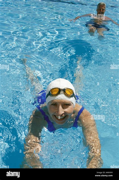 Mature Couple In Pool Stock Photo Alamy