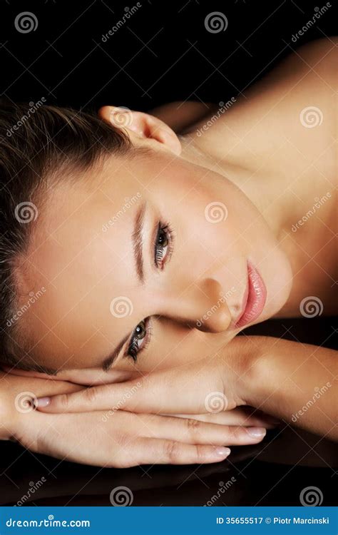 Portrait Of A Beautiful Nude Woman Lying On Her Belly Stock Image Image Of Bodycare Makeup