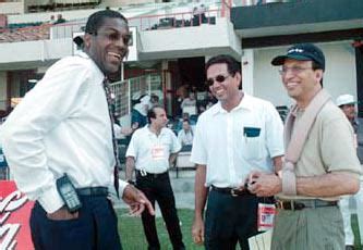 Holding and Asif Iqbal sharing a lighter moment | ESPNcricinfo.com